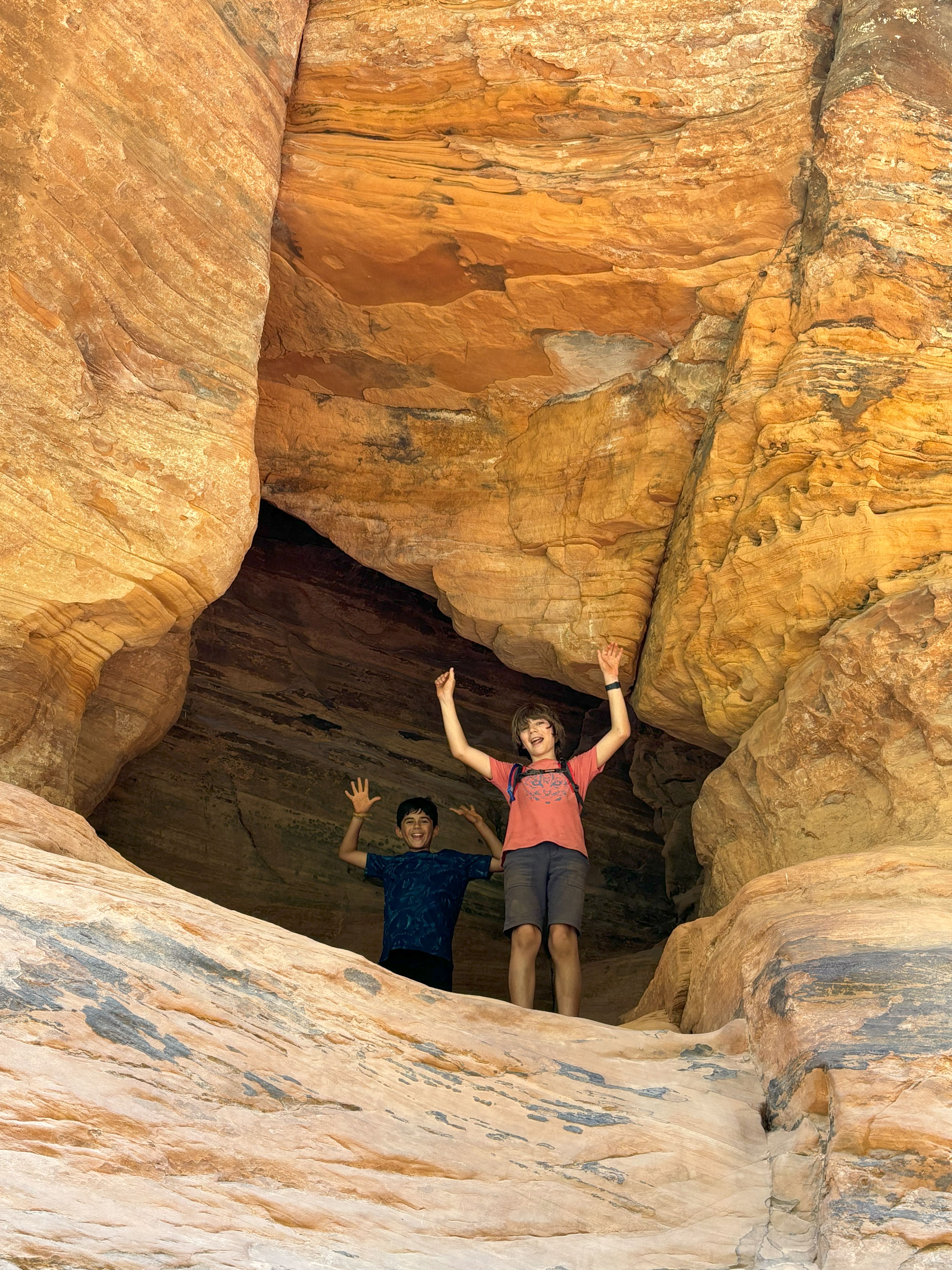 Charlie and Quinn in a cave
